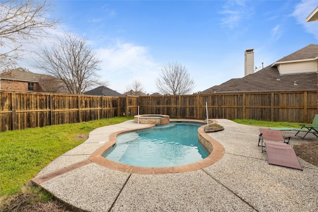 view of swimming pool with an in ground hot tub and a patio