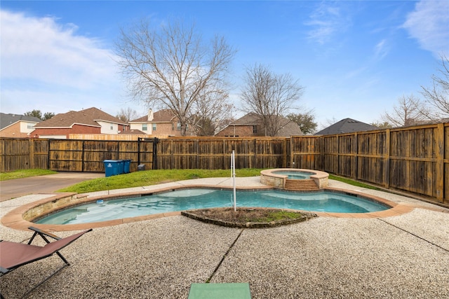 view of pool featuring an in ground hot tub and a patio