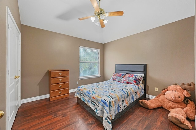 bedroom featuring dark hardwood / wood-style floors and ceiling fan