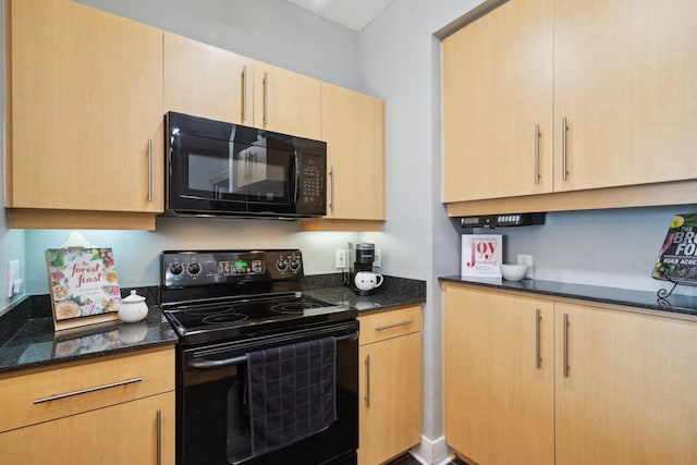 kitchen featuring dark stone countertops, light brown cabinets, and black appliances