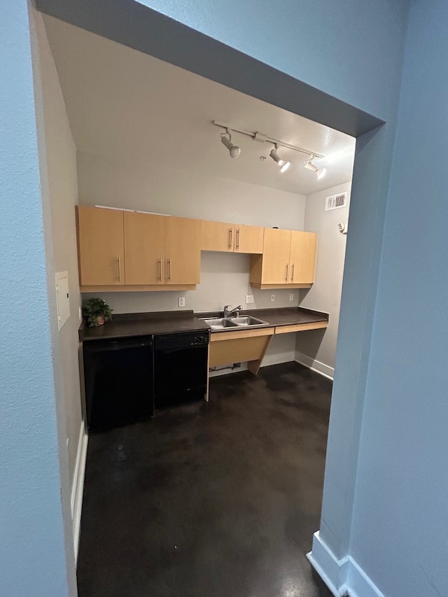 kitchen featuring rail lighting, light brown cabinetry, sink, and dishwasher