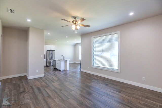 bathroom featuring vanity, toilet, and a textured ceiling