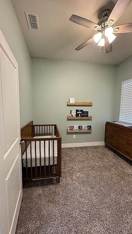 bedroom featuring ceiling fan