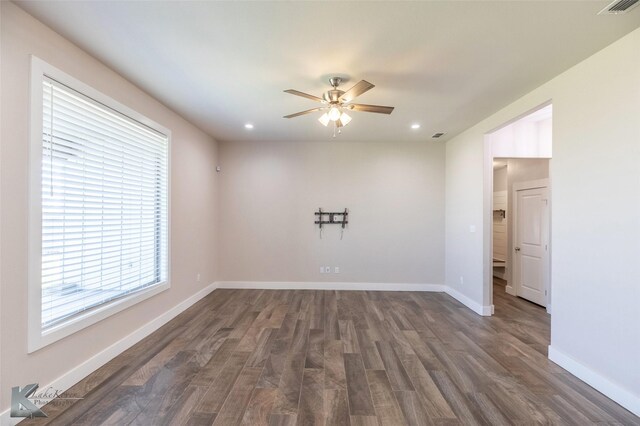 bedroom featuring vaulted ceiling, connected bathroom, light carpet, and ceiling fan