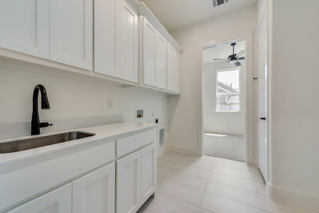 laundry room with sink, cabinets, ceiling fan, hookup for a washing machine, and electric dryer hookup