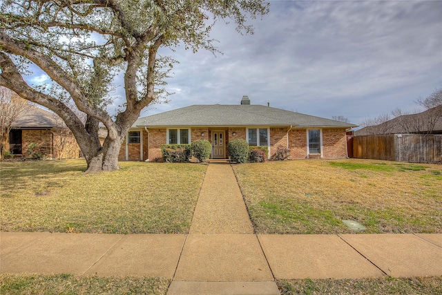 ranch-style house with a front lawn