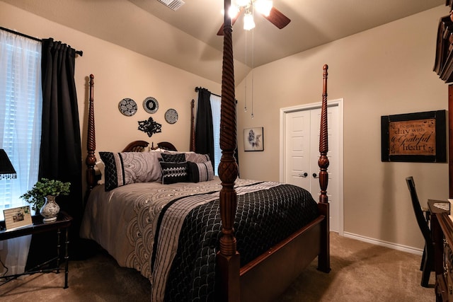 carpeted bedroom featuring vaulted ceiling and ceiling fan