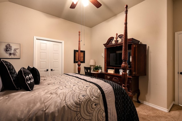 carpeted bedroom with lofted ceiling and ceiling fan