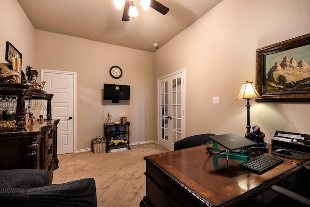 office area with french doors, light colored carpet, and ceiling fan