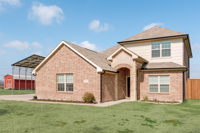 view of front of house with a carport and a garage