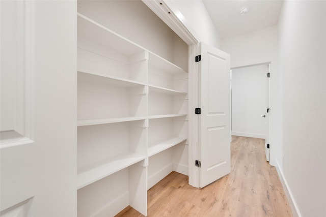 hallway featuring light hardwood / wood-style floors