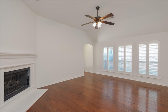 unfurnished living room featuring dark wood-type flooring, ceiling fan, and lofted ceiling