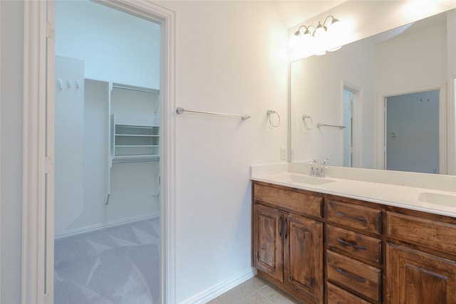 bathroom featuring vanity and tile patterned flooring