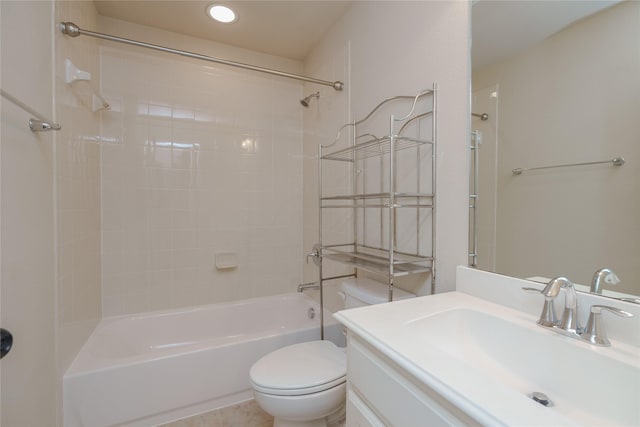 full bathroom featuring vanity, toilet, and tiled shower / bath combo