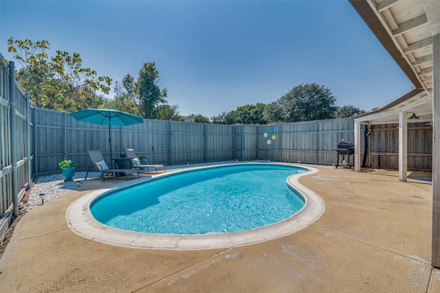 7502 Atlantic Dr, Rowlett, TX 75088 - view of pool with a fenced backyard, a patio area, and a grill