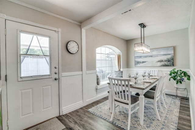 dining area featuring hardwood / wood-style floors and a wealth of natural light