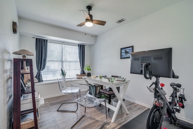 7502 Atlantic Dr, Rowlett, TX 75088 - office with a ceiling fan, baseboards, and wood finished floors