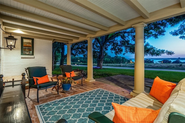 patio terrace at dusk with an outdoor living space