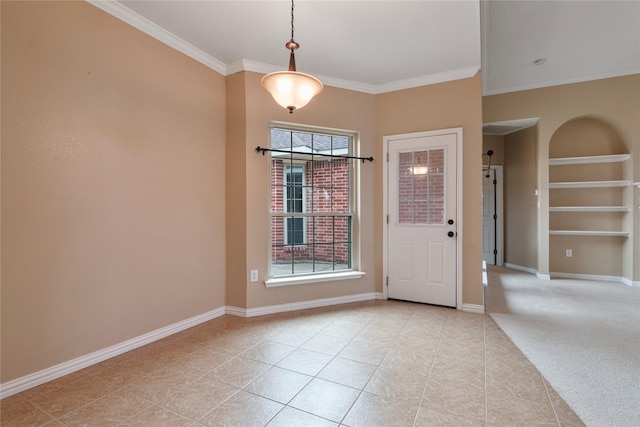 tiled foyer featuring ornamental molding