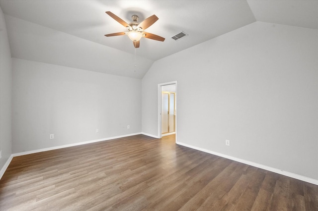 unfurnished room featuring hardwood / wood-style floors, vaulted ceiling, and ceiling fan