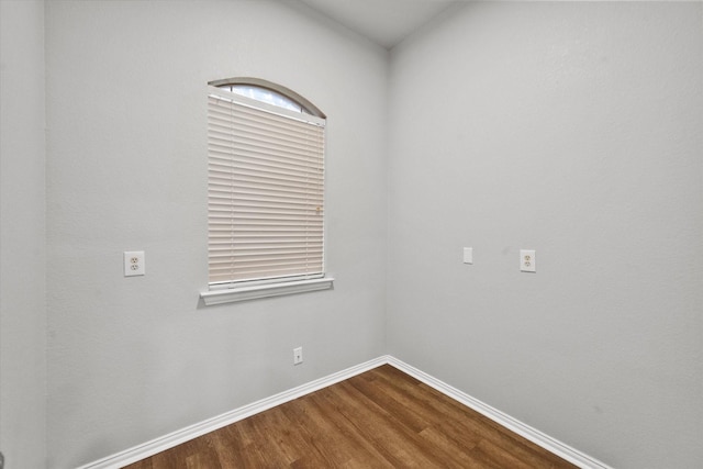 spare room featuring hardwood / wood-style floors