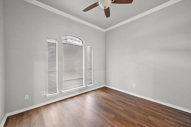 spare room featuring ornamental molding, dark hardwood / wood-style floors, and ceiling fan