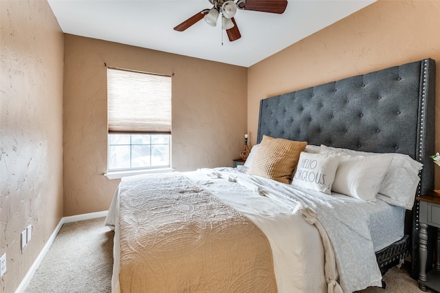 bedroom with ceiling fan and carpet