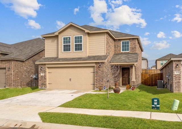 view of front of house with a garage, central AC, and a front yard