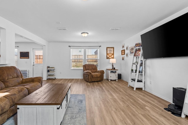 living room featuring light hardwood / wood-style floors