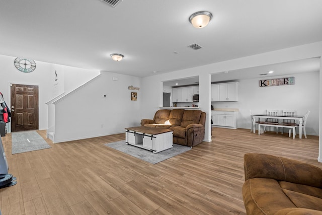 living room featuring light wood-type flooring