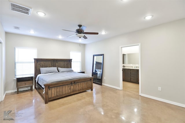 bedroom featuring ceiling fan and ensuite bathroom