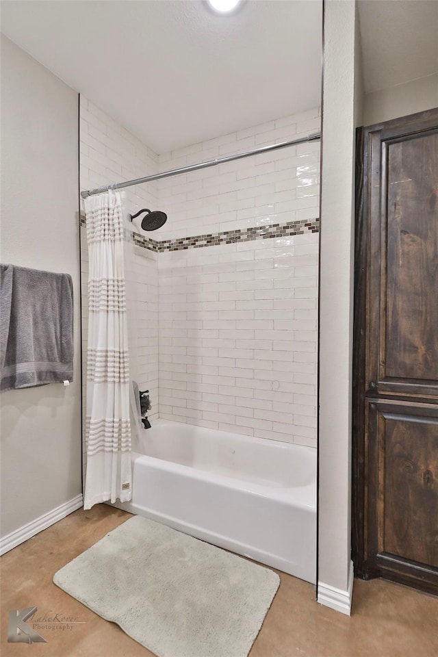 bathroom featuring shower / bath combination with curtain