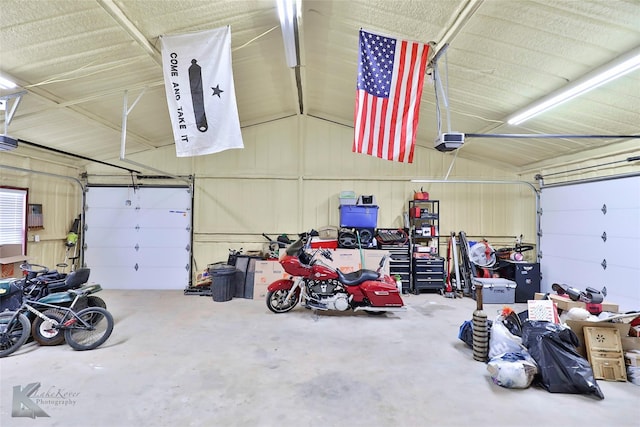 garage featuring a garage door opener