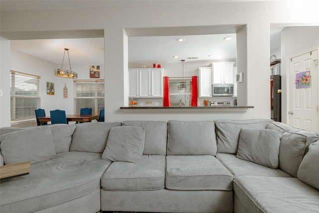 living room featuring sink