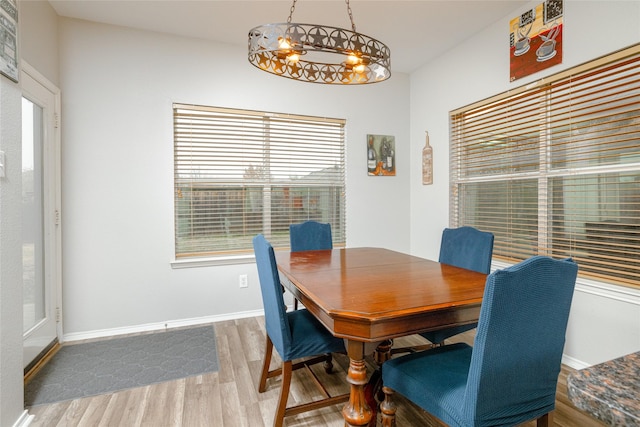 dining area featuring wood-type flooring