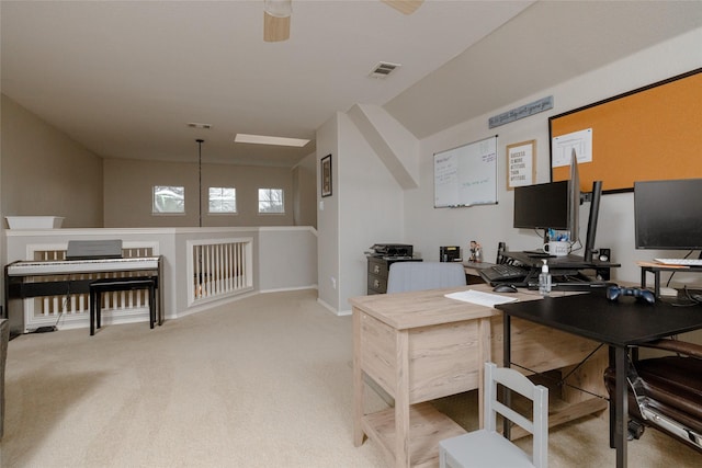 home office with ceiling fan and light colored carpet