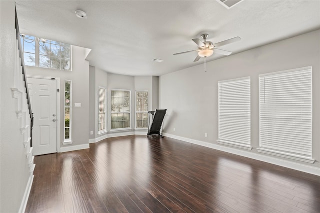 foyer featuring dark hardwood / wood-style floors and ceiling fan