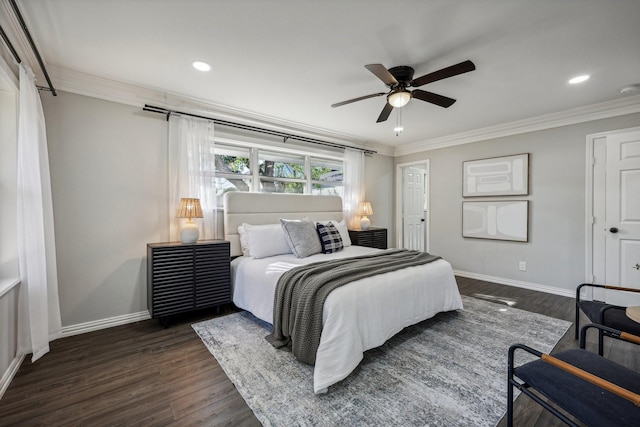 bedroom featuring baseboards, ornamental molding, and dark wood-style flooring