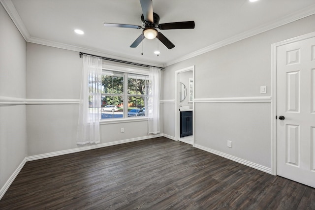 interior space featuring baseboards, dark wood-style flooring, and crown molding