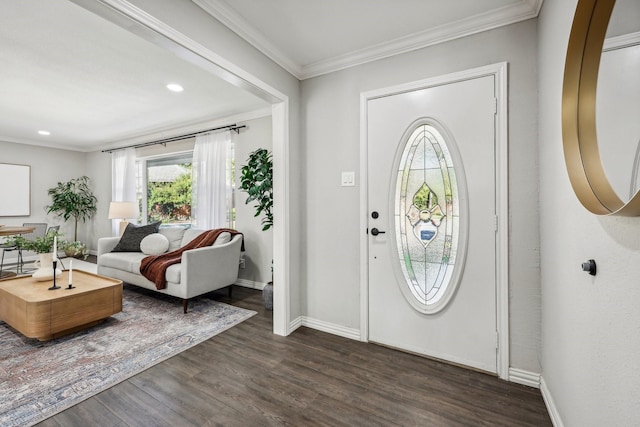 foyer featuring dark wood-style floors, baseboards, crown molding, and recessed lighting