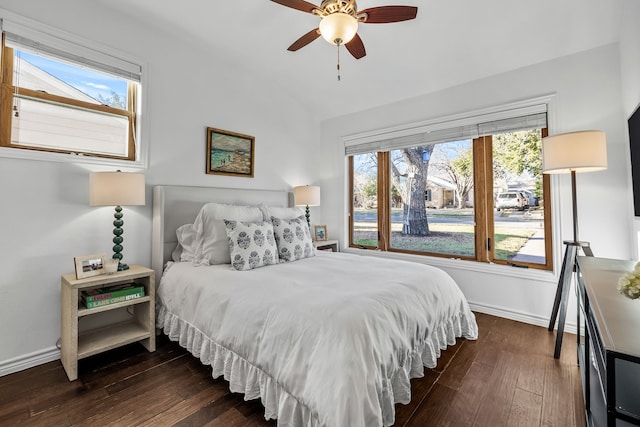 bedroom featuring vaulted ceiling, dark wood-type flooring, and ceiling fan