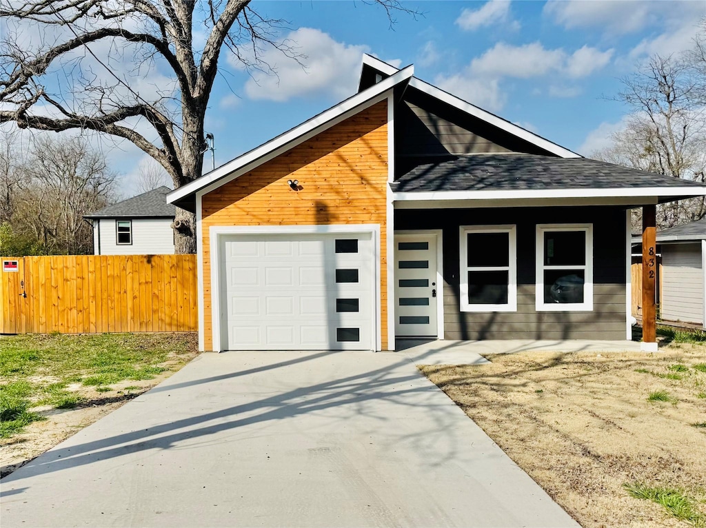 view of front of property with a garage