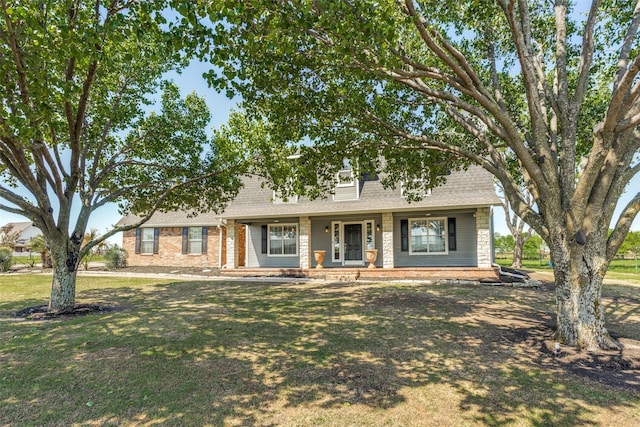 view of front of property with a front lawn