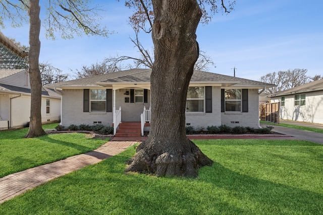 ranch-style house with a front lawn