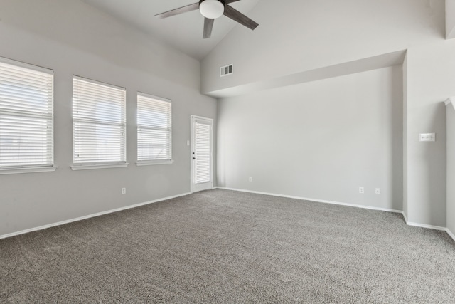 unfurnished room featuring ceiling fan, high vaulted ceiling, and carpet