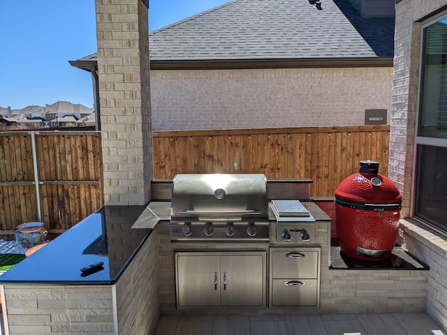 view of patio featuring area for grilling and grilling area