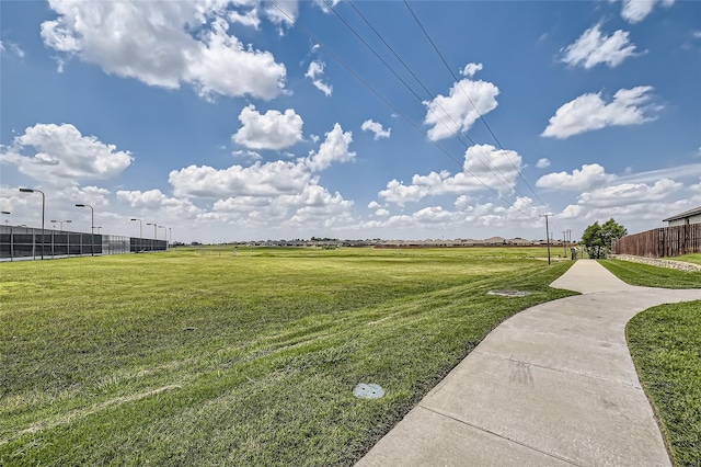 view of yard with a rural view