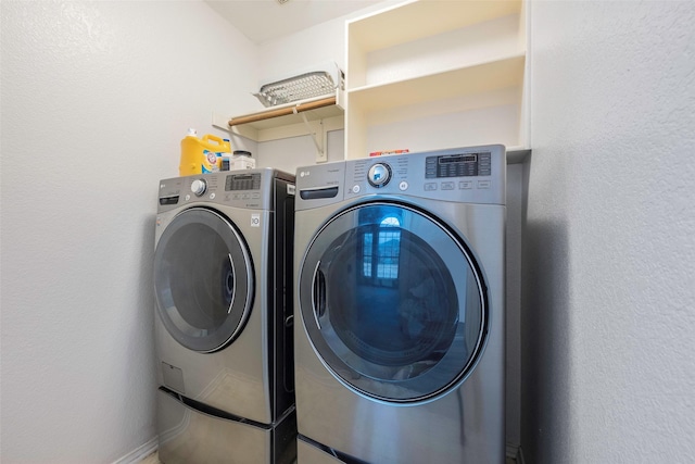 laundry area with washer and clothes dryer