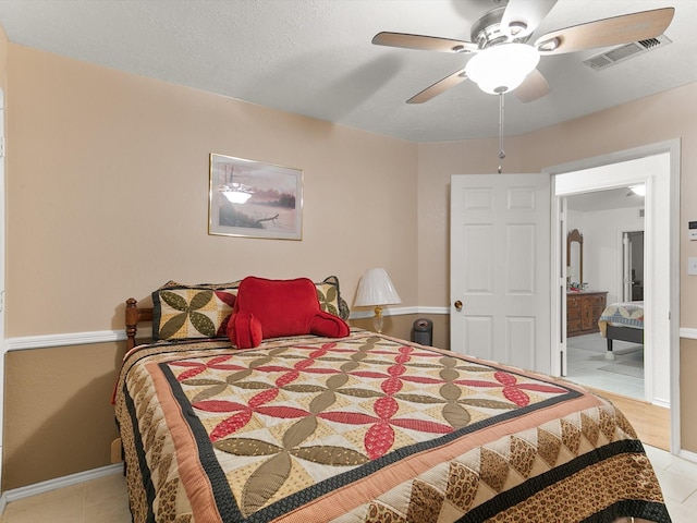 bedroom with light tile patterned floors and ceiling fan