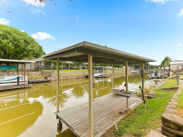 dock area featuring a water view